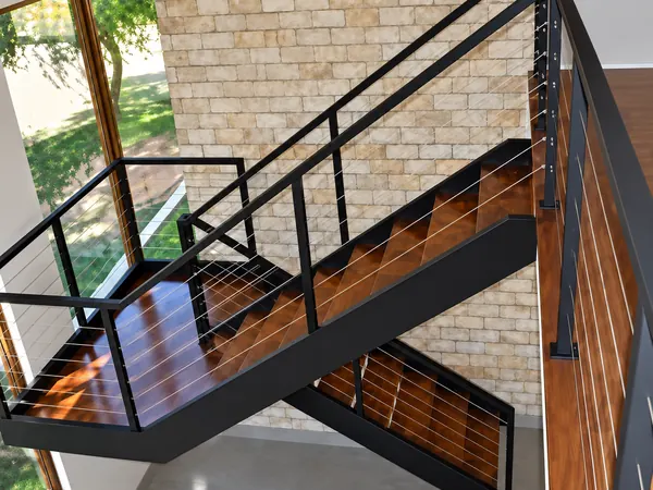 Escada de aço com guarda-corpo feita pela ARB Vidros